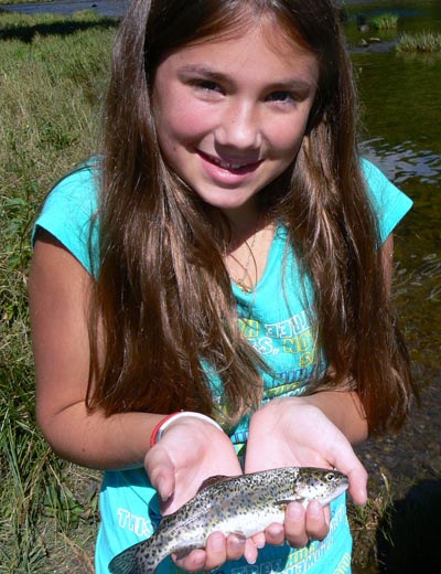 Amanda catches and releases Rainbow Trout on the South Holston River in eastern Tennessee